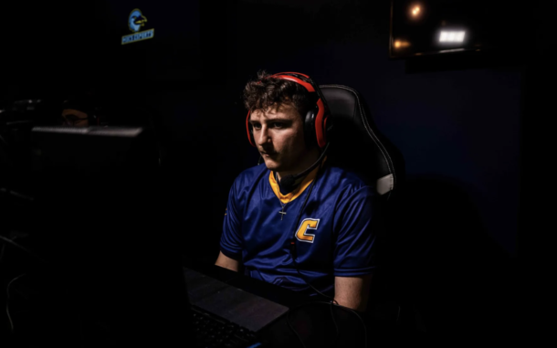 UTC esports coordinator Chase Daffron—a December 2024 graduate—is also a business analyst in the University’s IT department and an MBA student. Photo by Ray Soldano.